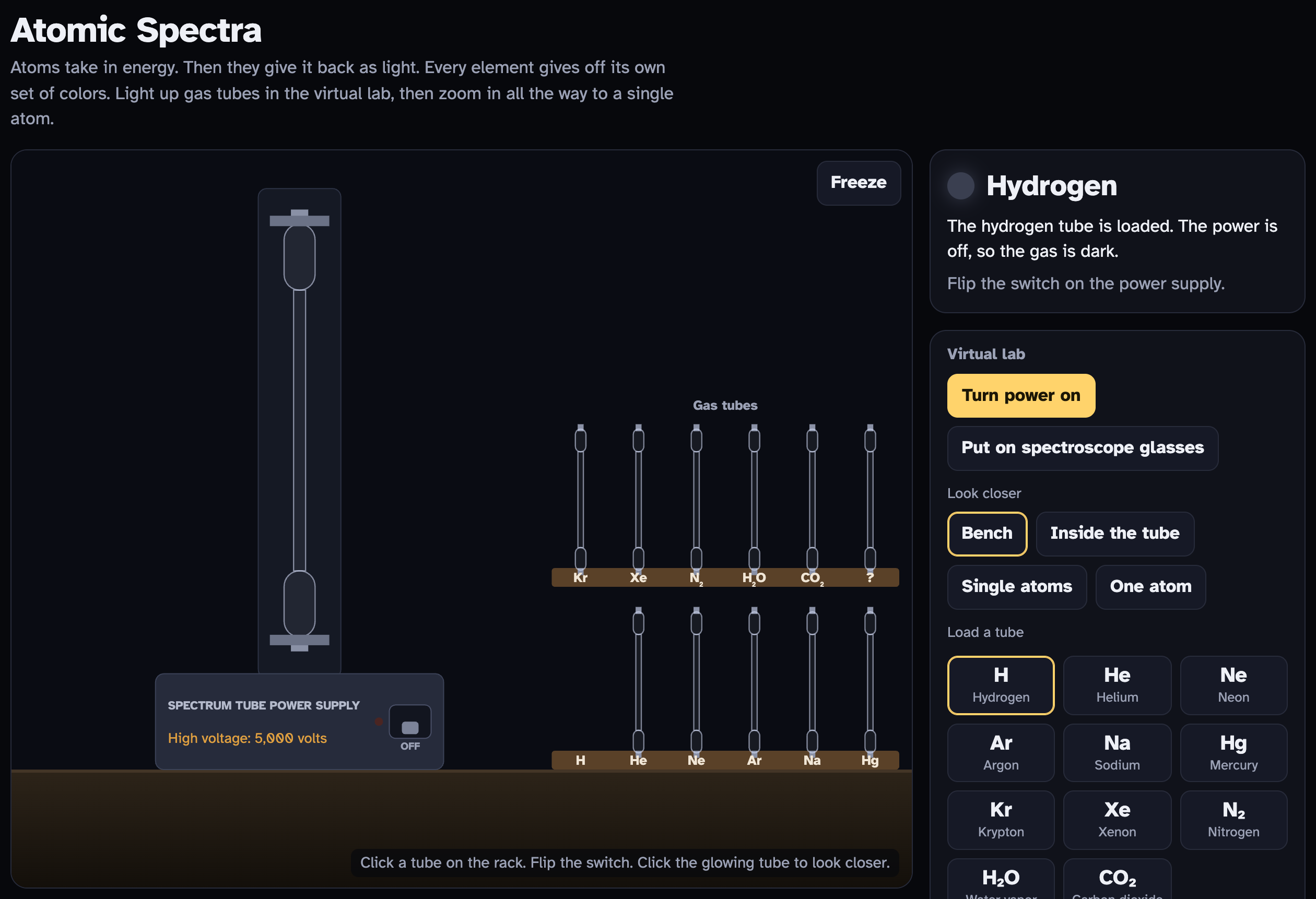 The top of the lab page: the title Atomic Spectra, a picture of a lab bench with a power supply and a rack of gas tubes, and a Virtual lab box of buttons beside it